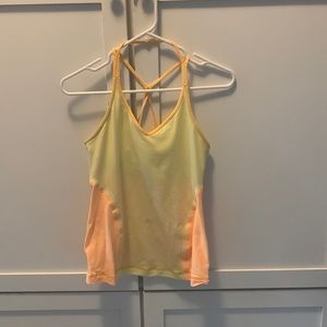 Lululemon yellow strappy workout tank.